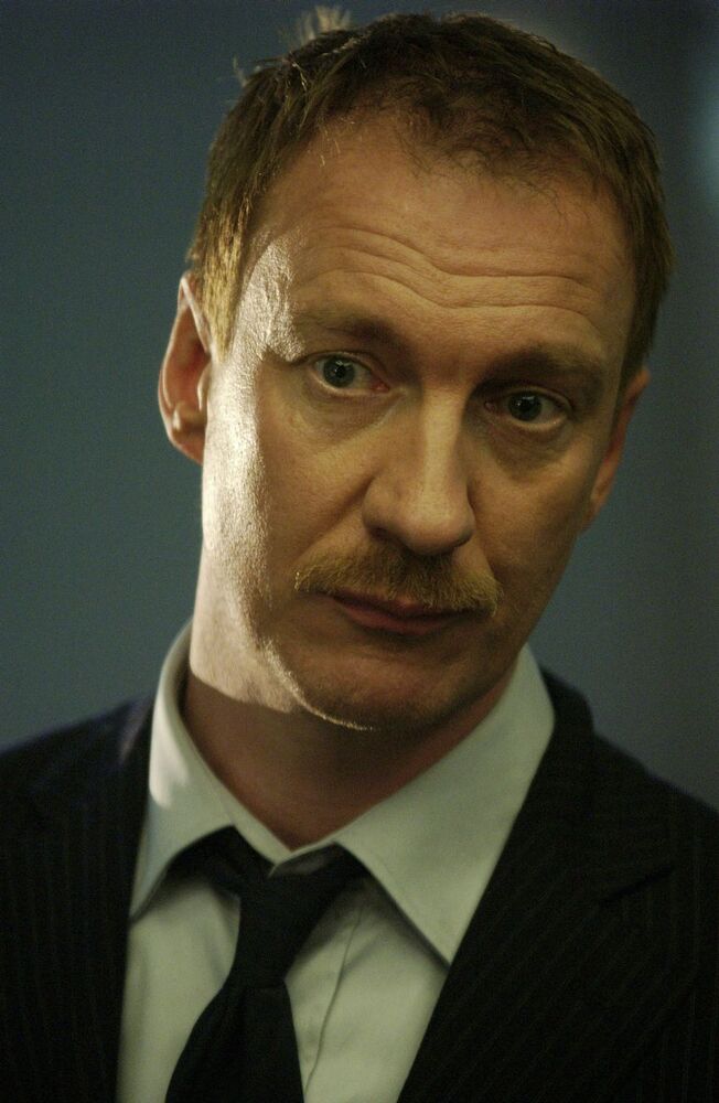 Who portrayed Remus Lupin in the Harry Potter movies? 2