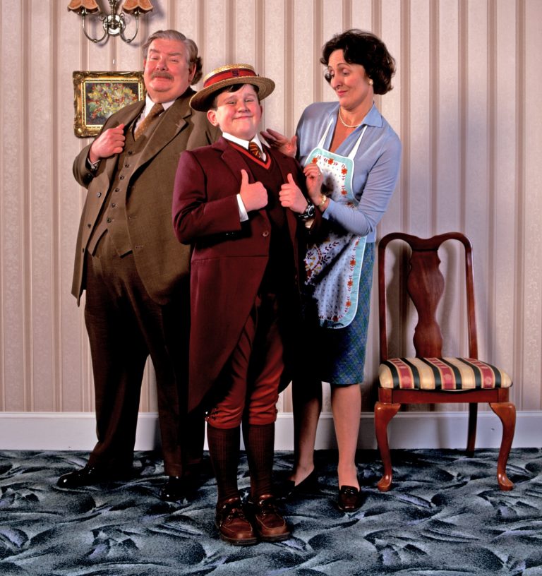 What Are The Traits Of The Dursley’s Next-door Neighbor?