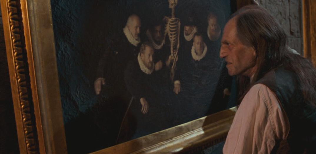 Who is the portrait of the Healer who trained Dumbledore?