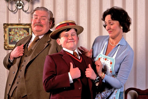 What are the traits of the Dursley's next-door neighbor? 2